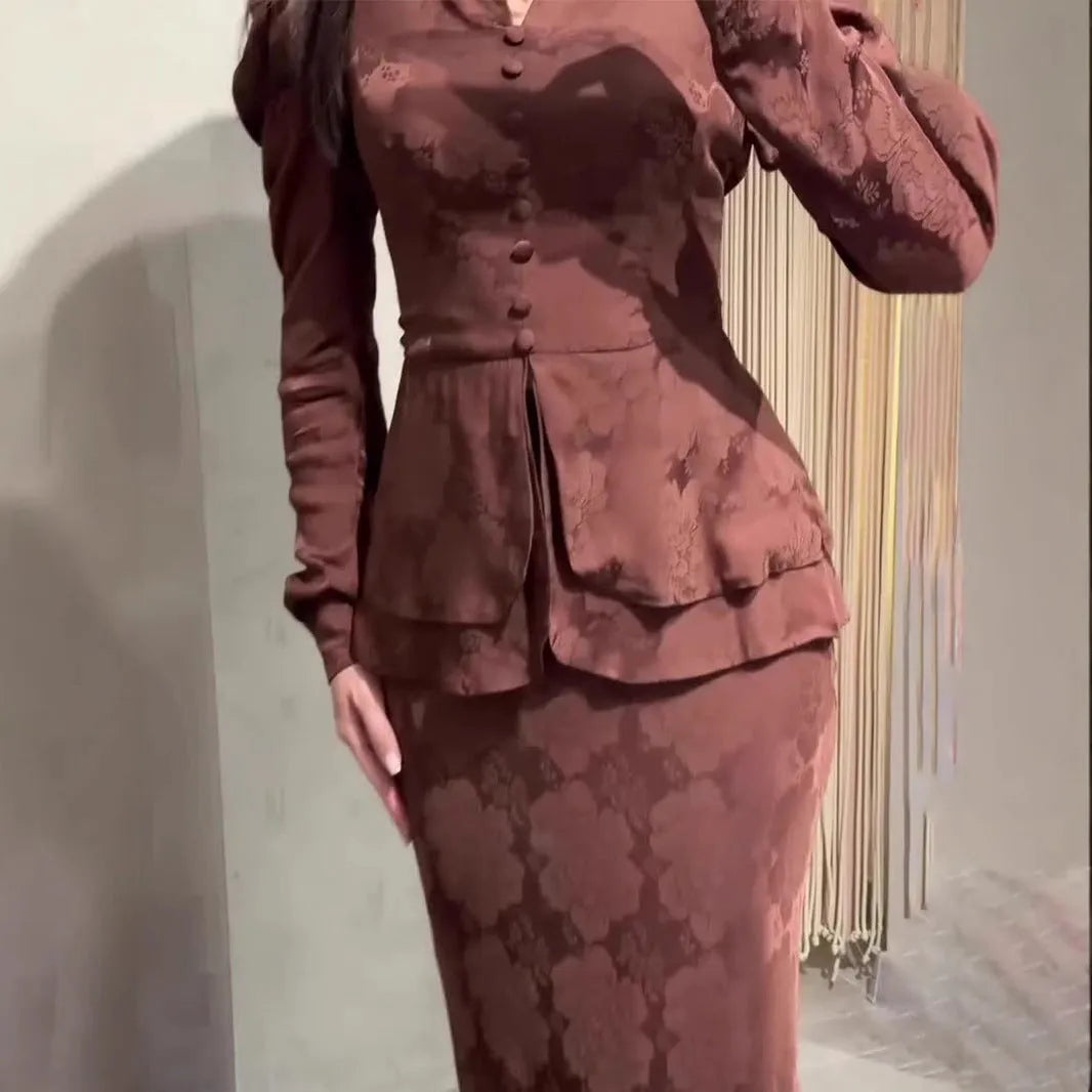 Women's dark brown artistic retro dress with plant pattern and button detailing showing long sleeves and fake two-piece styling
