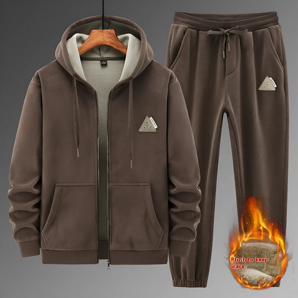 Men's grey hooded sports sweater and matching trousers laid flat.