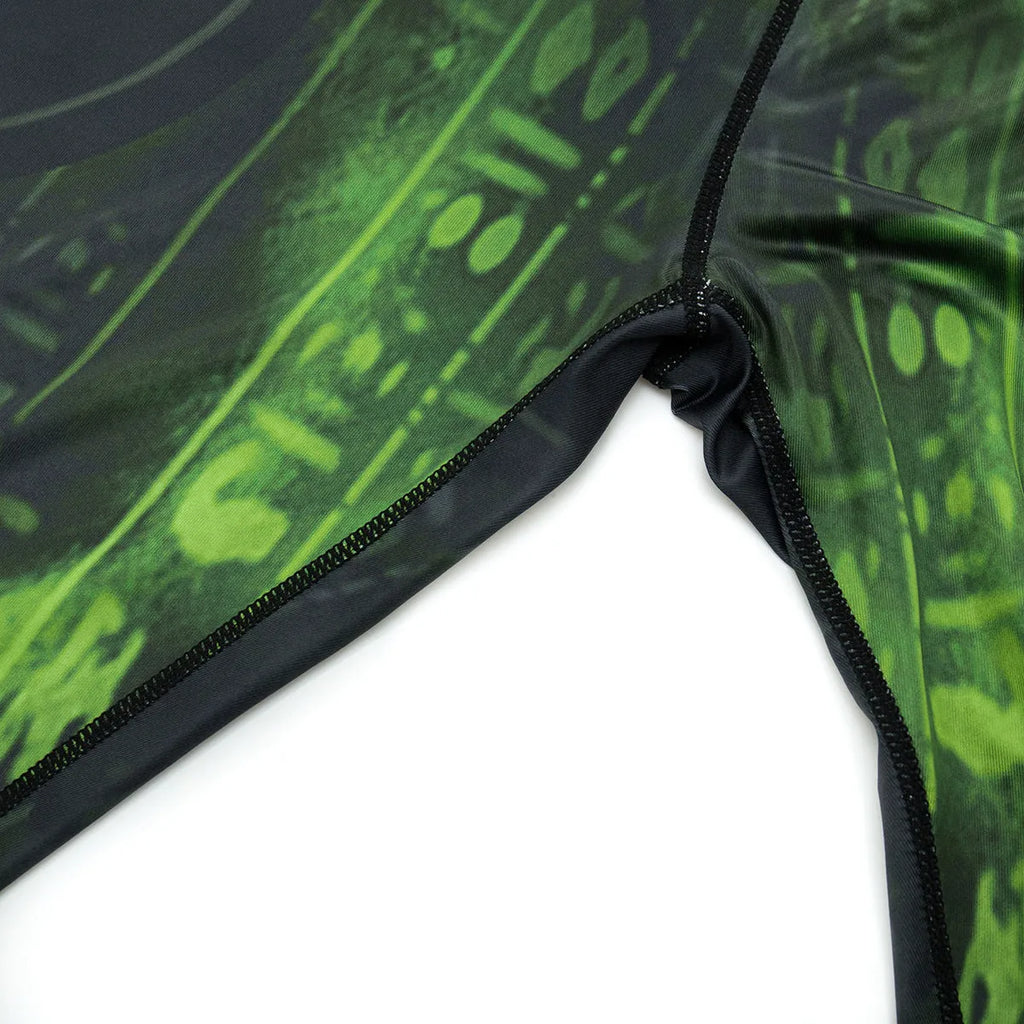 Man wearing a slim fit, long sleeve ZF016 printing style sports suit for running and fitness activities.