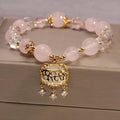 Khaki yellow agate crystal bracelet for women with gold silk threading.
