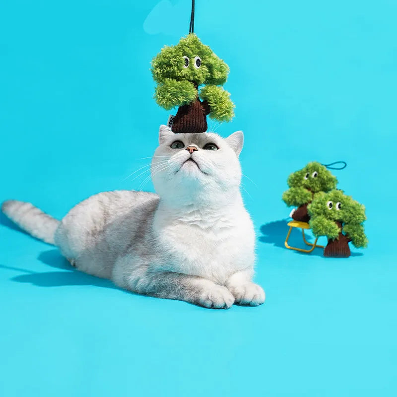 Pine tree shaped cat toy with cat mint element hanging for interactive play