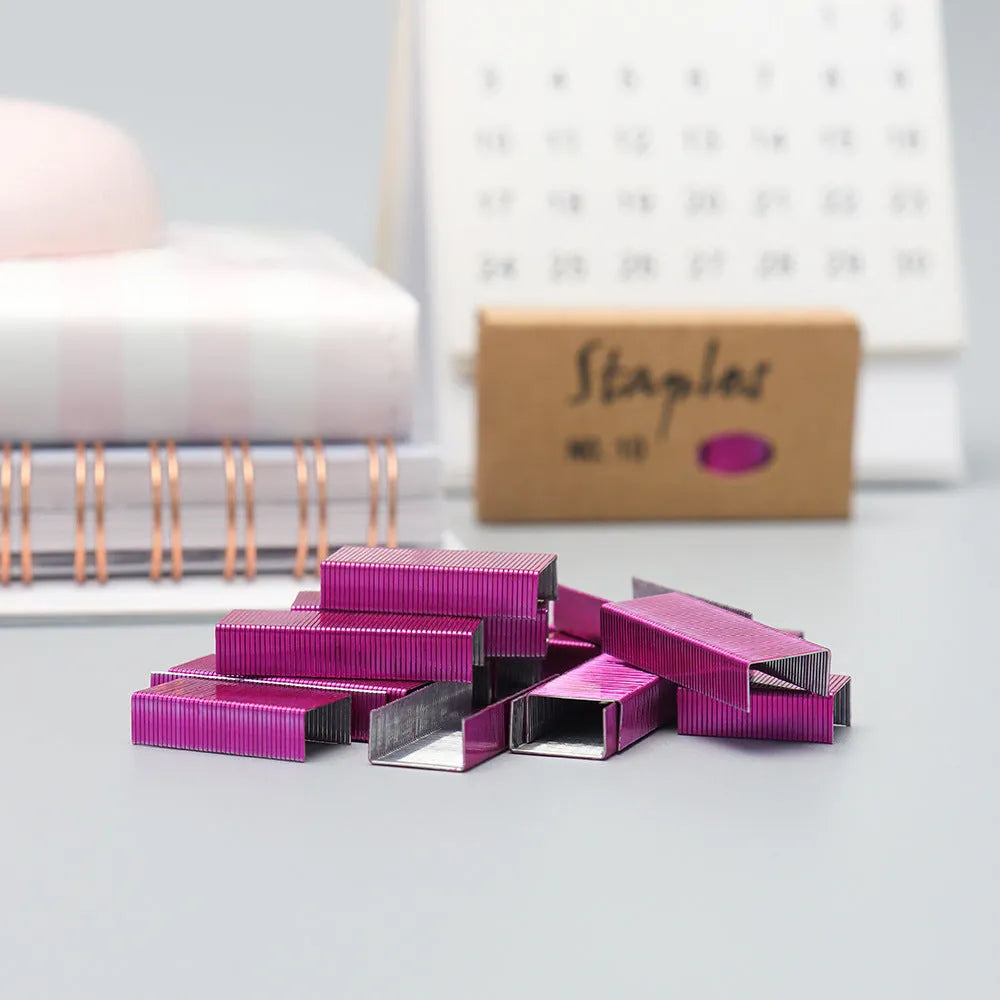 Box of 1000 metal stitching staples in a choice of black, purple, rose gold, or rose red.
