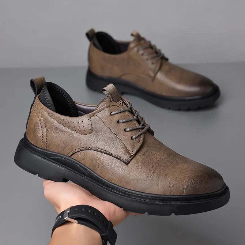 Men's black leather business sneakers with sewing line details on two-layer cowhide upper and rubber sole