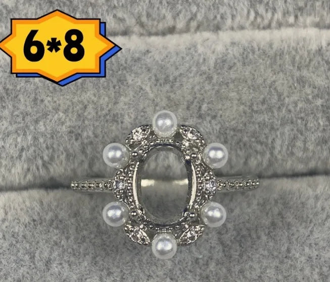 Oval denier ring with open mouth design and five-pointed star decoration on copper band