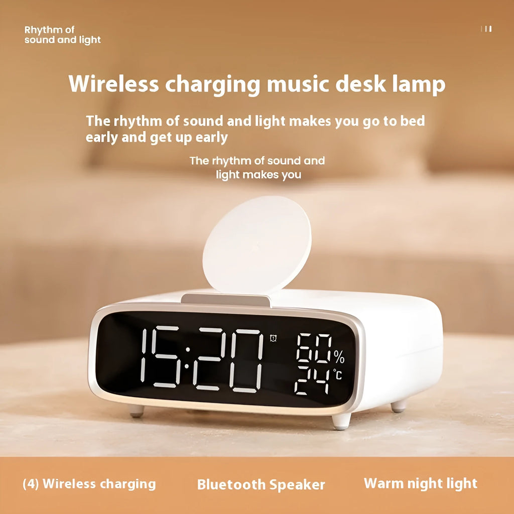 White wireless charger Bluetooth speaker with night light on desk beside smartphone