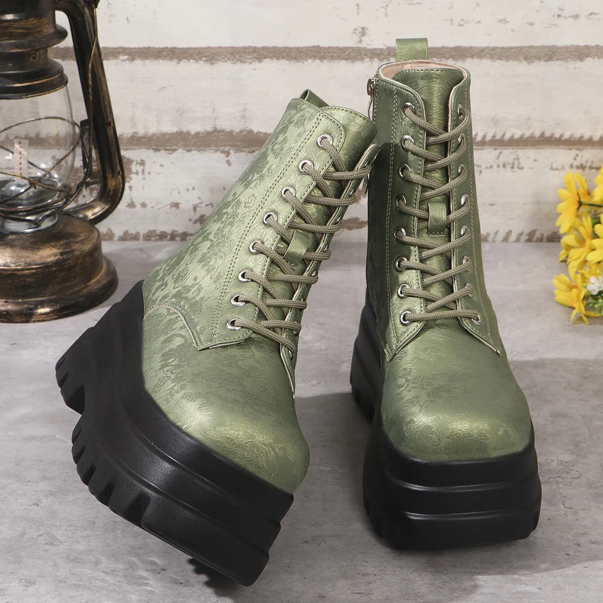 Women's white retro platform Martin boots with chunky heel and side zipper on a neutral background.
