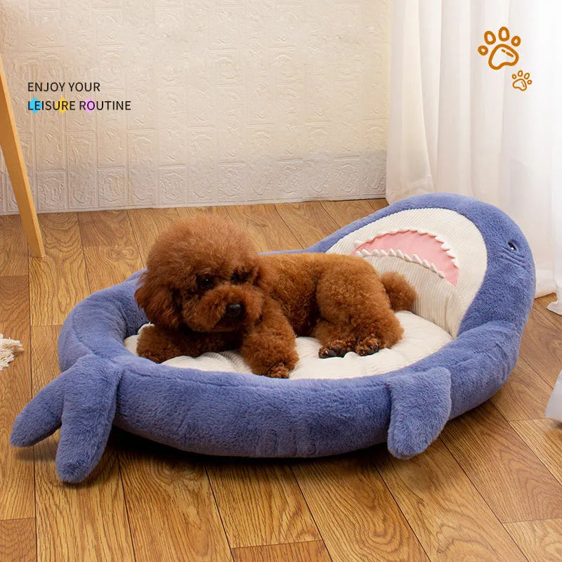 Blue shark pattern pet bed with anti-slip base showing velvet fabric texture