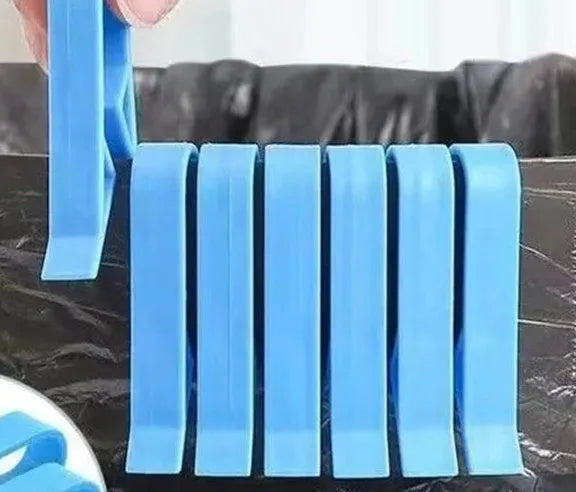 PP plastic non-slip clip for fixing a bin bag to the side of a trash can.