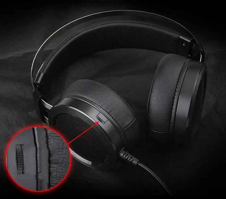 Black wired over-ear computer gaming headset with a long cable and a 3.5mm plug.