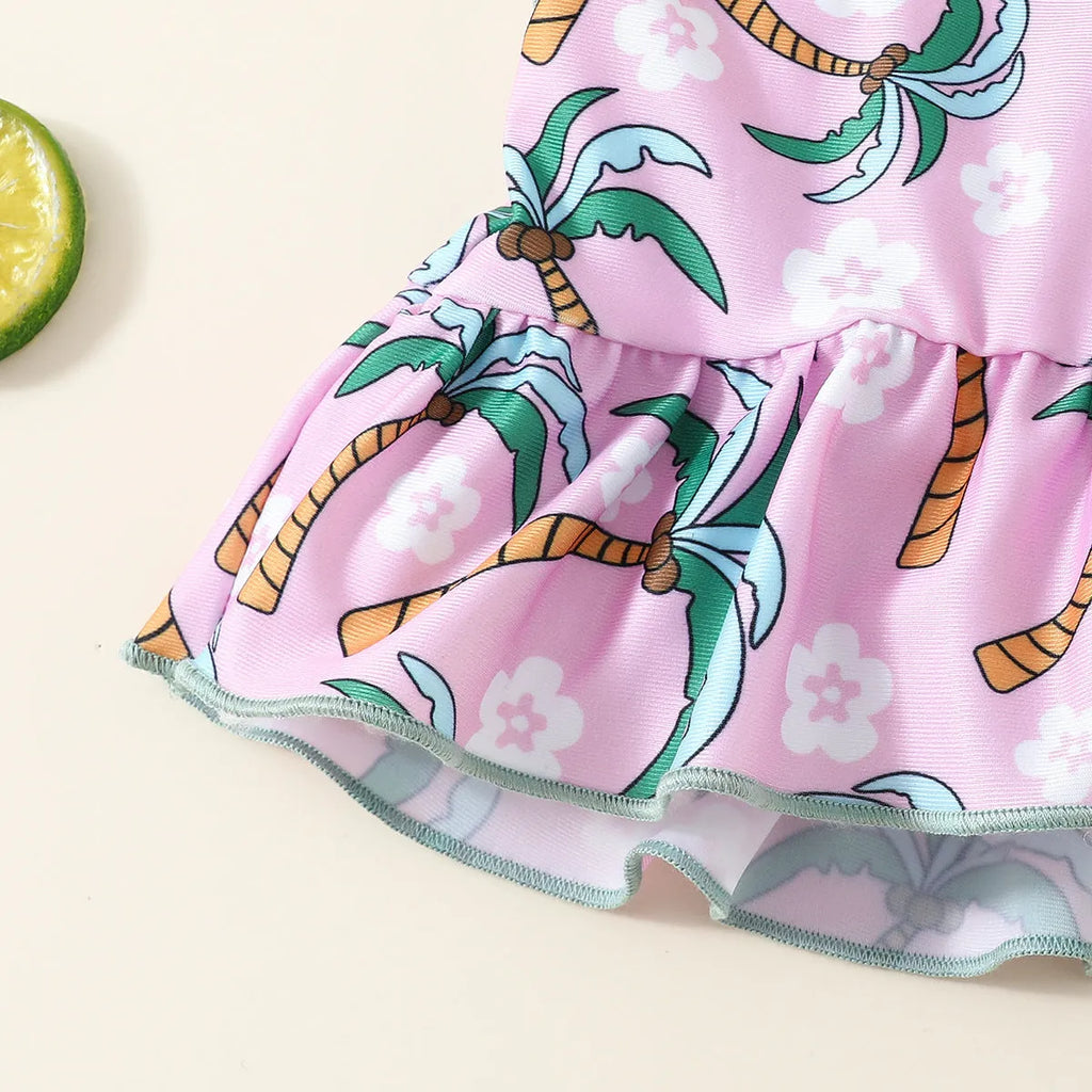 Girls' white two-piece swimsuit set with a shirt and matching shorts on a hanger