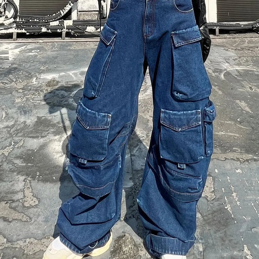 Dark blue wide-leg distressed jeans with high waist and multiple pockets on a mannequin