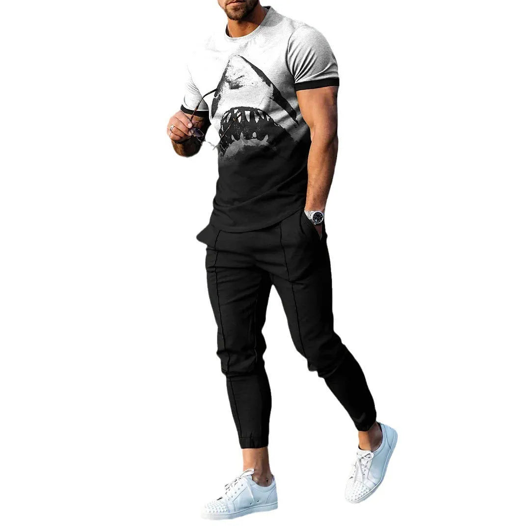 Man wearing a thin, short-sleeve polyester blend pullover and matching trousers from a sports tracksuit set.