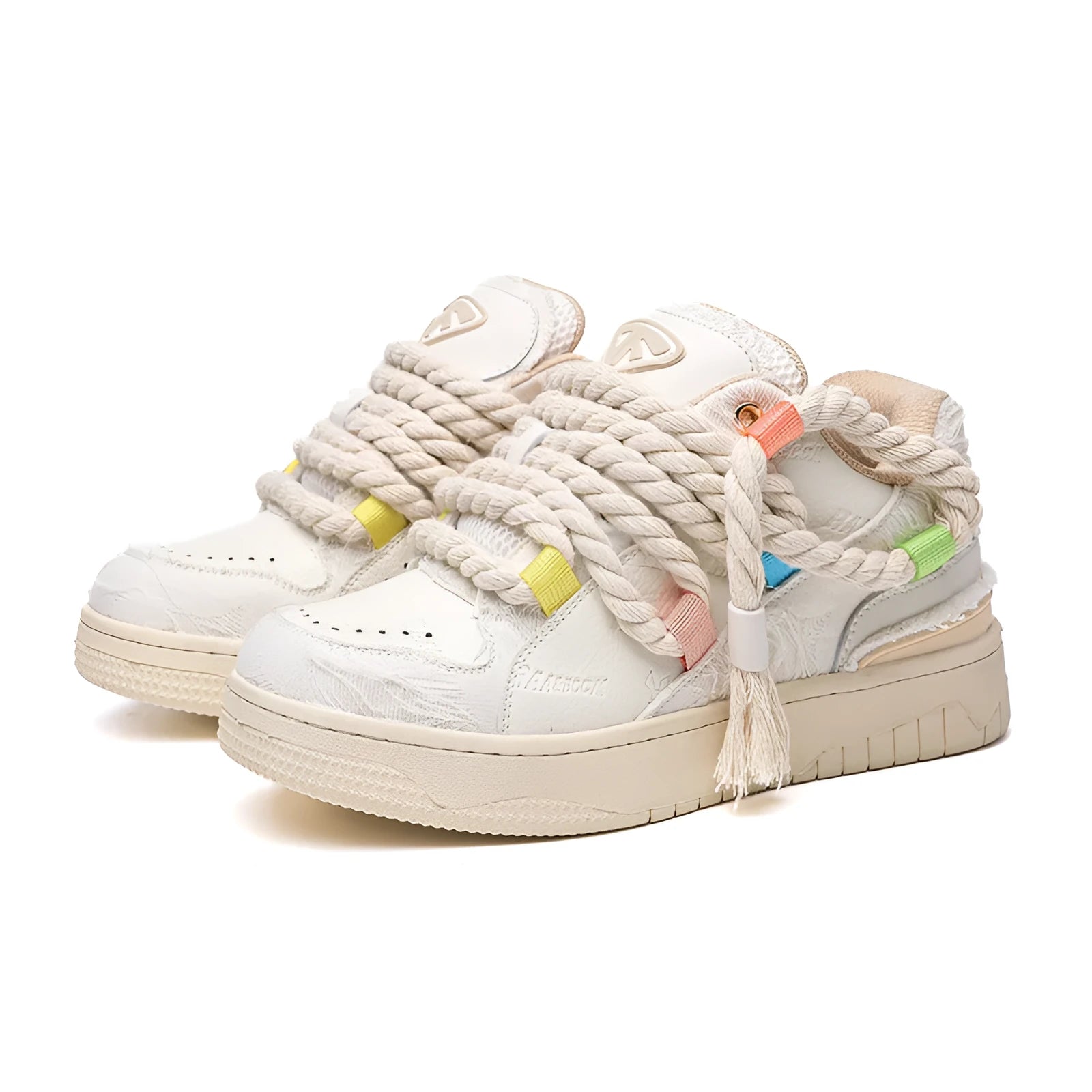 Creamy white low-top retro skate shoes with lace-up front and platform sole.