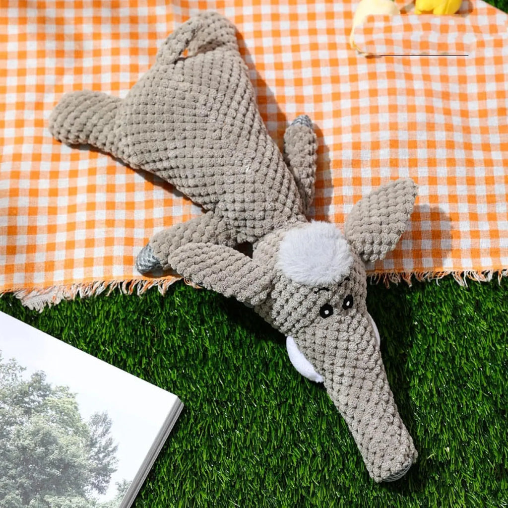 Animal shaped plush dog chew toy with corn kernel texture design for teeth cleaning