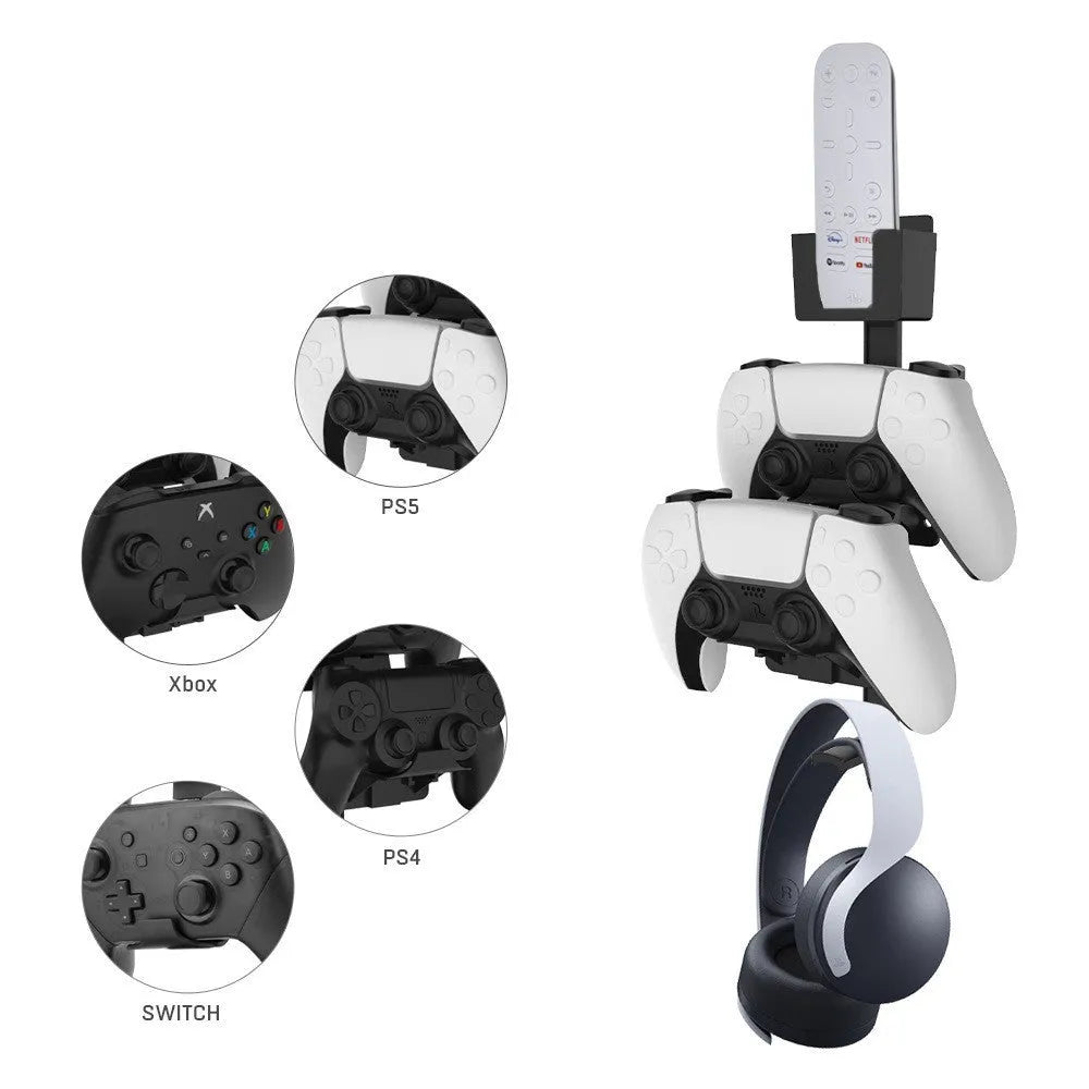 White wall-mounted plastic hook holding a game controller and remote control