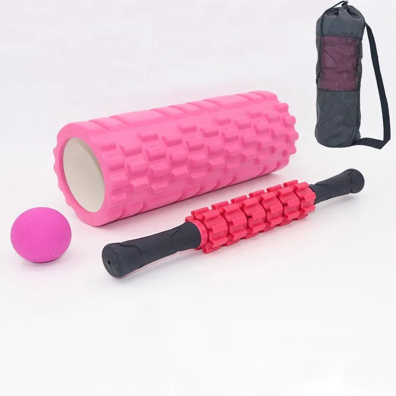 Black fitness foam roller massage stick measuring 33cm in length.