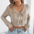 Women's khaki lace-up hollow-out long sleeve casual coat on hanger