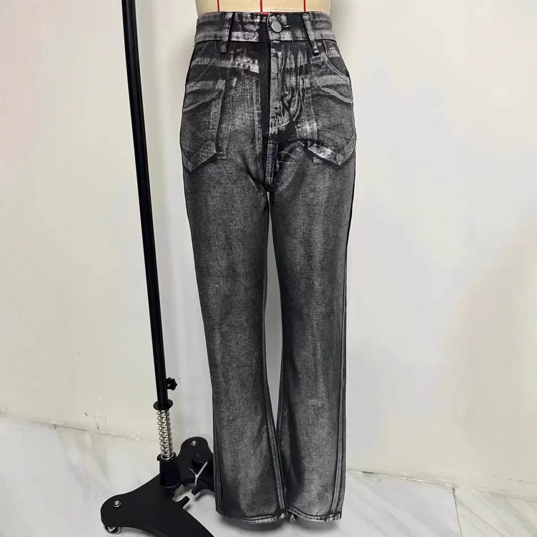 Women's washed blue high-waist straight-leg jeans with silver contrast hardware on a denim background.