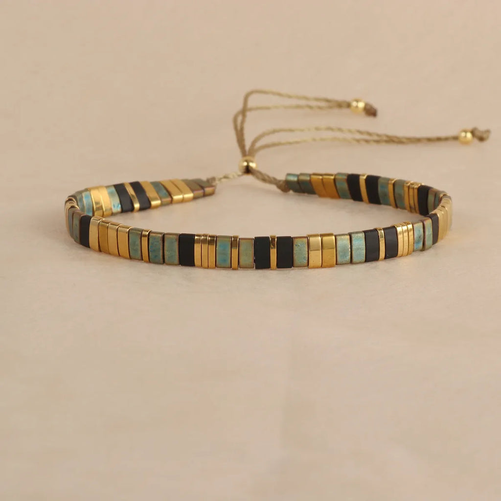 Geometric glass bead bracelet with pull bead closure in five colour options
