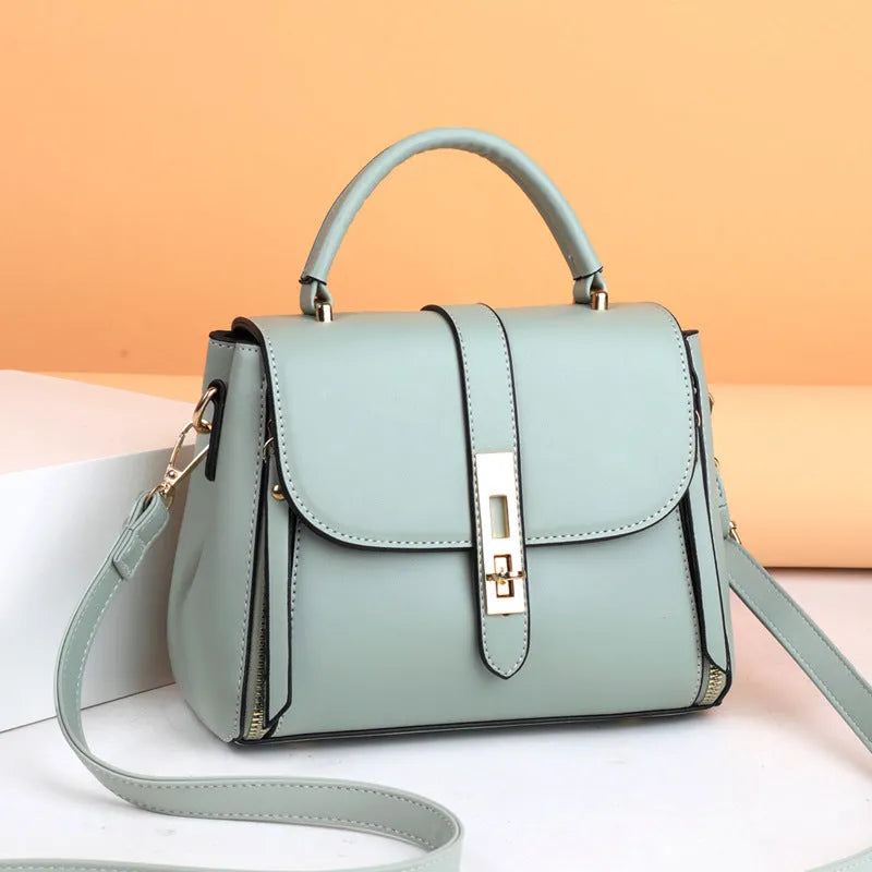 Soft PU leather women's messenger bag in a square vertical shape, shown in one of four colours.