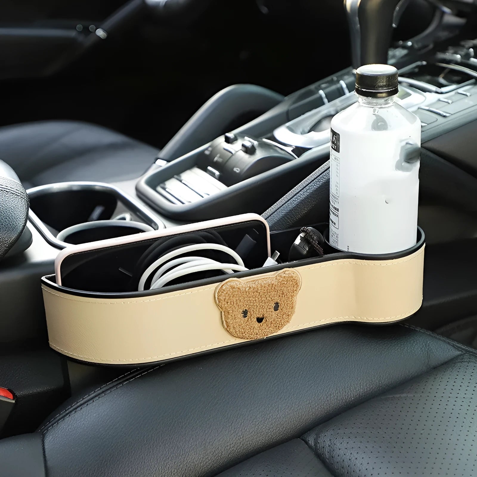 Leather car seat gap storage box with cartoon bear design hanging between vehicle seats