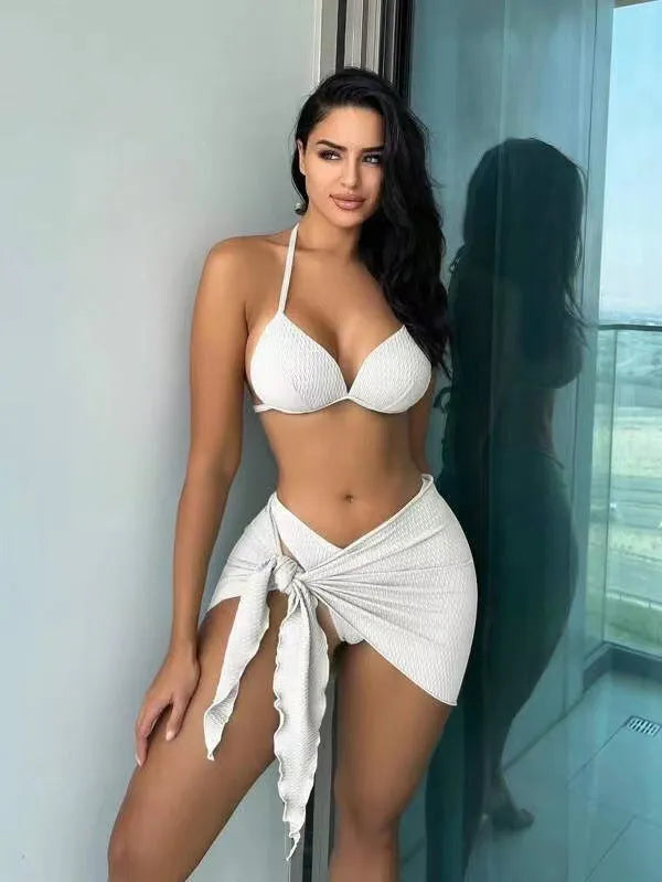 Women's Russian split three piece swimsuit set in solid colour with coordinating top, panties, and skirt