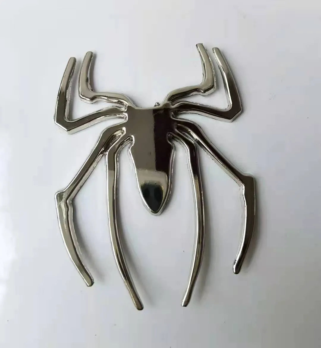Three-dimensional zinc alloy spider bumper sticker in metallic colours