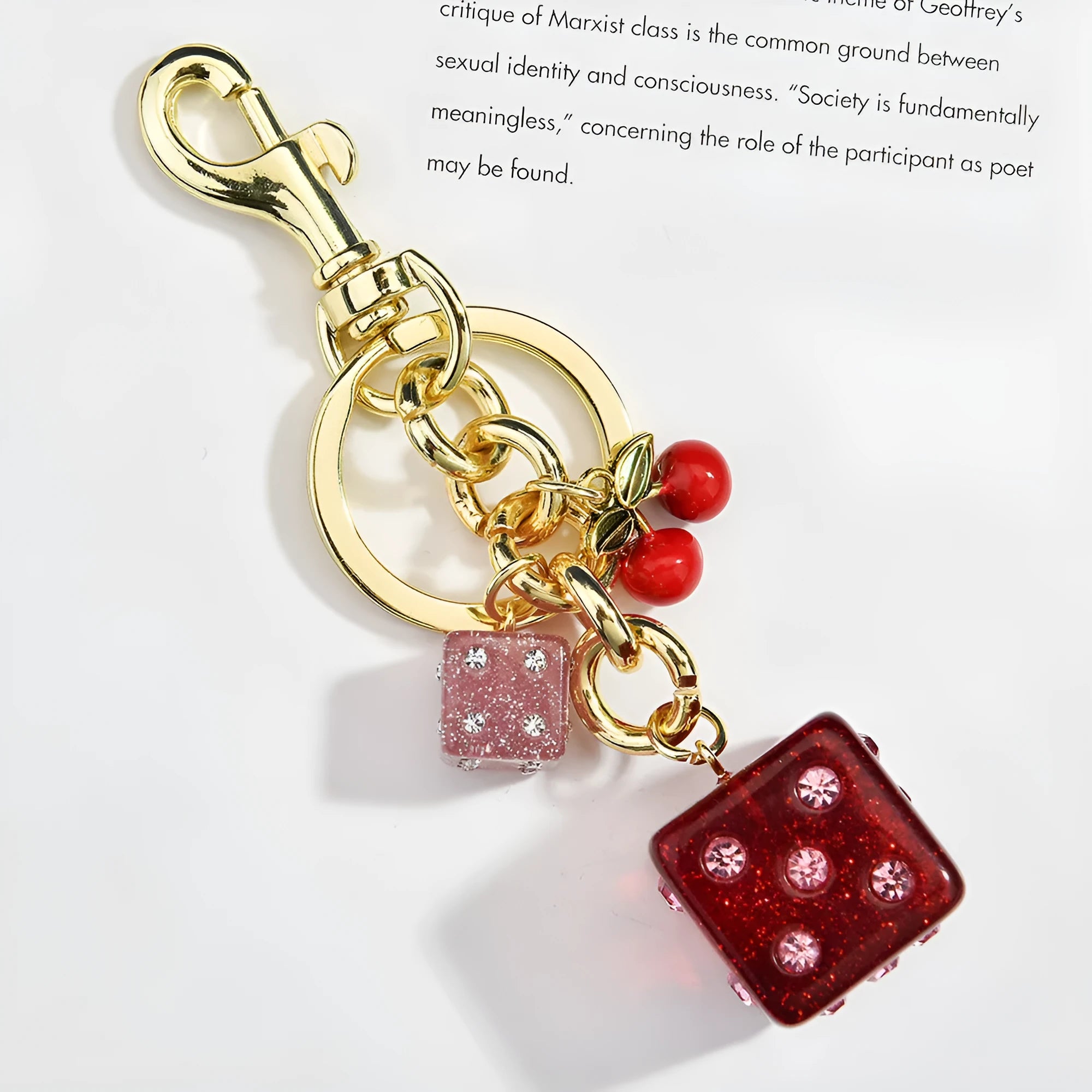 Square metal keychain pendant with a vintage cherry two-tone dice pattern for luggage or bags.