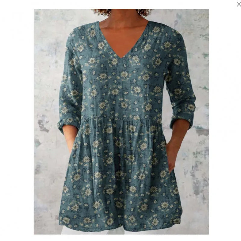 Women's printed wave dress with 3/4 sleeves and loose wide waist fitting in polyester fabric