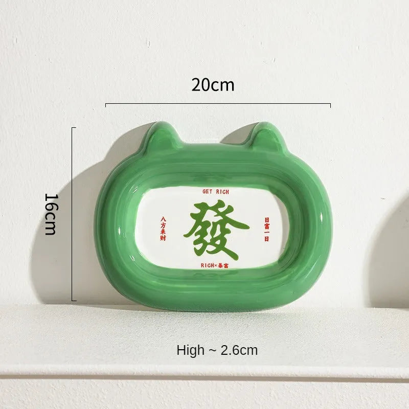 Ceramic pet bowl with an animal design, shown on a table