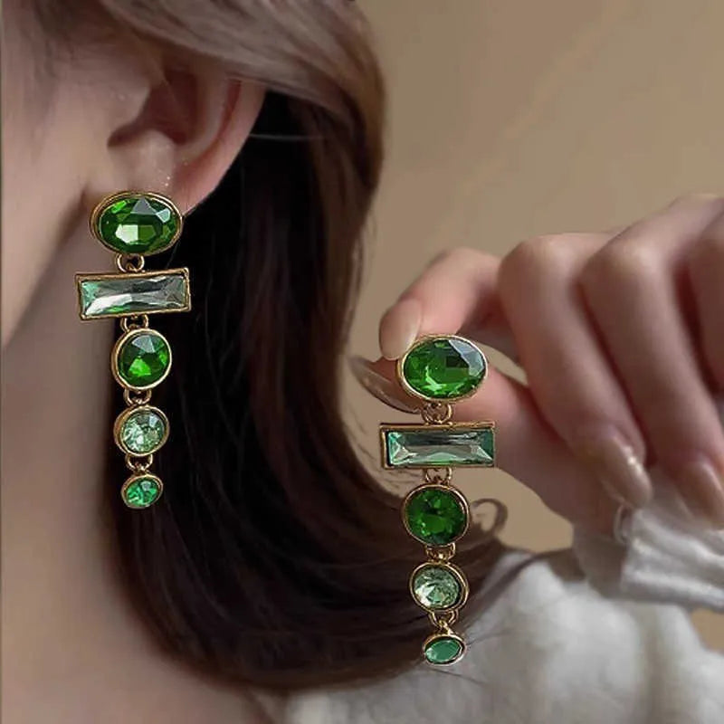 Geometric Chinese-style alloy earrings with green gradient colour, zircon inlay treatment and tassel detailing