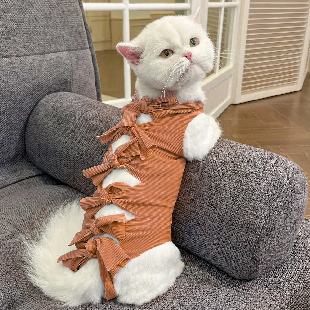 Lace-up polyester cat sterilisation recovery suit in assorted colours on a size chart