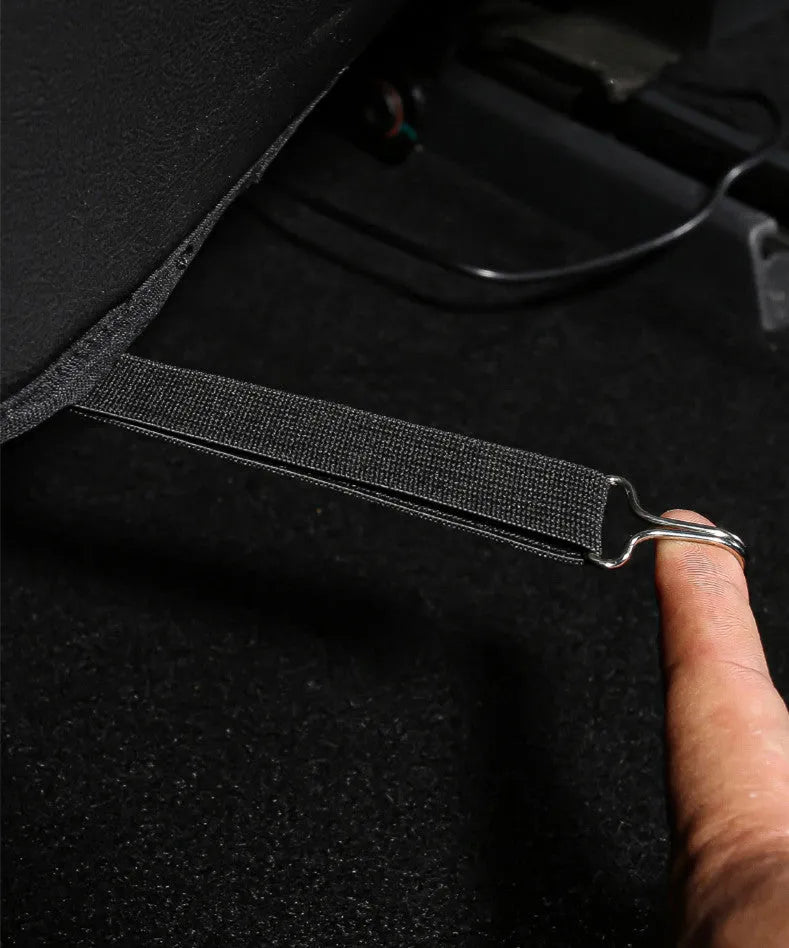 Black leather rear anti kick pad for car seats, measuring 68cm by 42cm.
