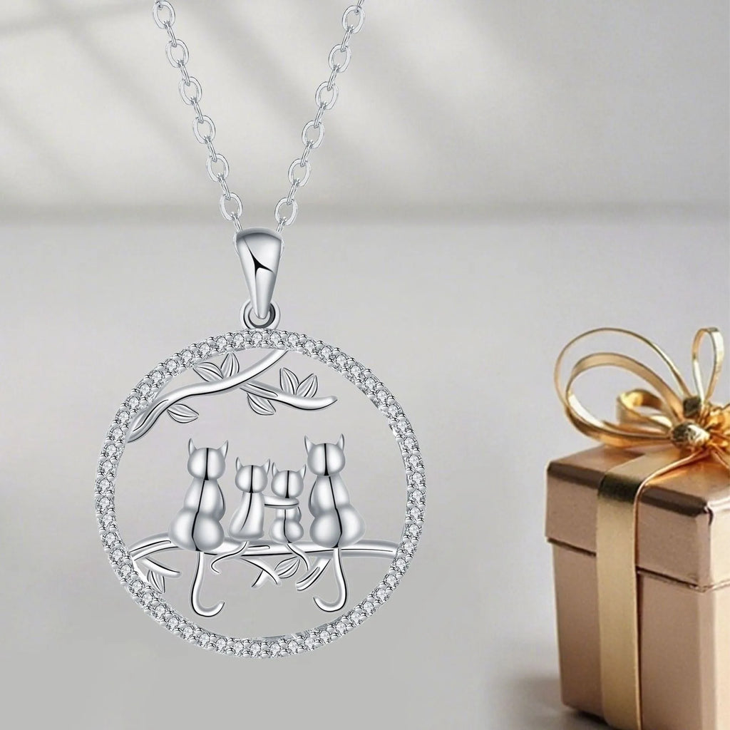 Copper necklace with four kitten pendant design on cross chain style