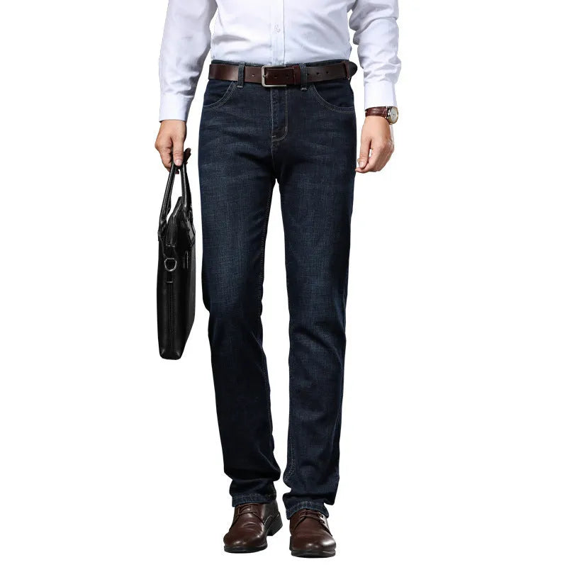 Women's straight leg stretch jeans in K276 blue denim, shown in a loose fit on a model.