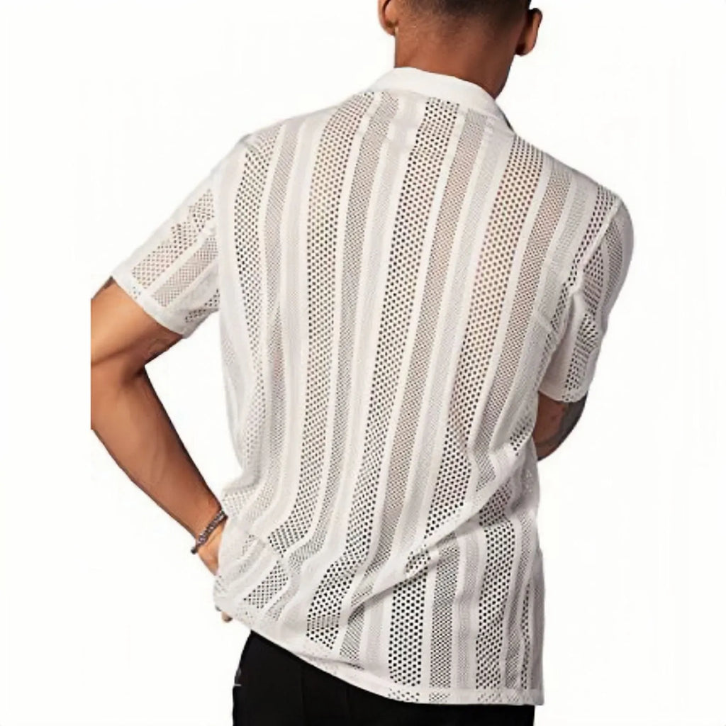 Man wearing a black knitted short-sleeved button shirt with a jacquard pattern, cardigan style.