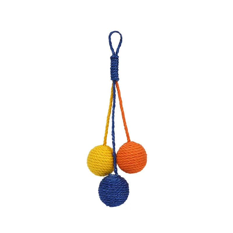 Four-piece cat toy set showing 255mm teaser wand with string, catnip ball, self-play wire, and fabric element in assorted colours