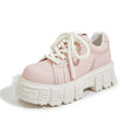 Women's beige and pink casual leather shoes with a rubber foam sole on a white background