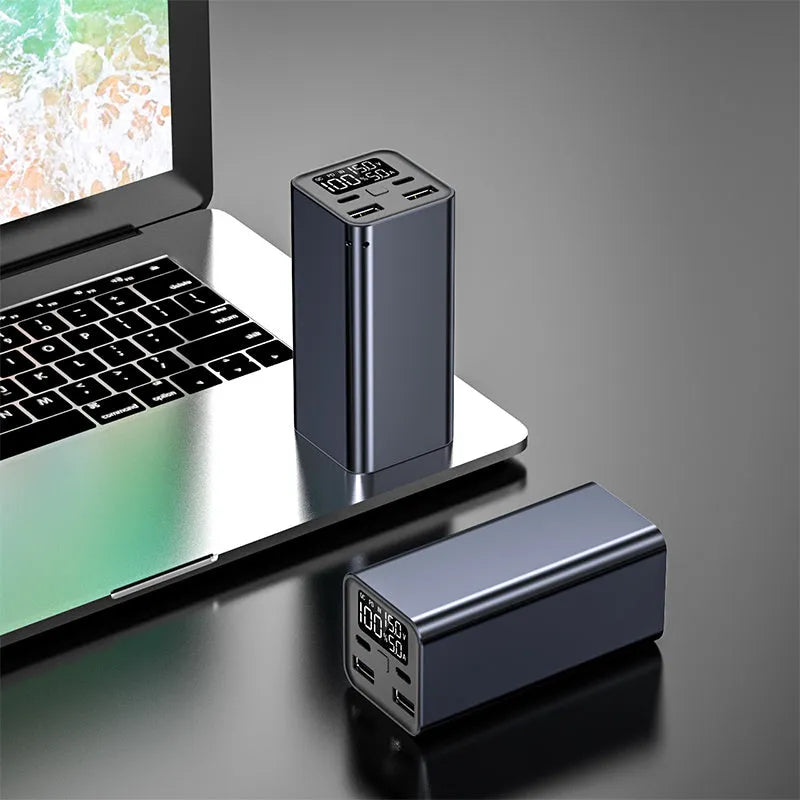 Metal laptop charging bank with 65W output and 20000mAh capacity in black, blue, or grey colours