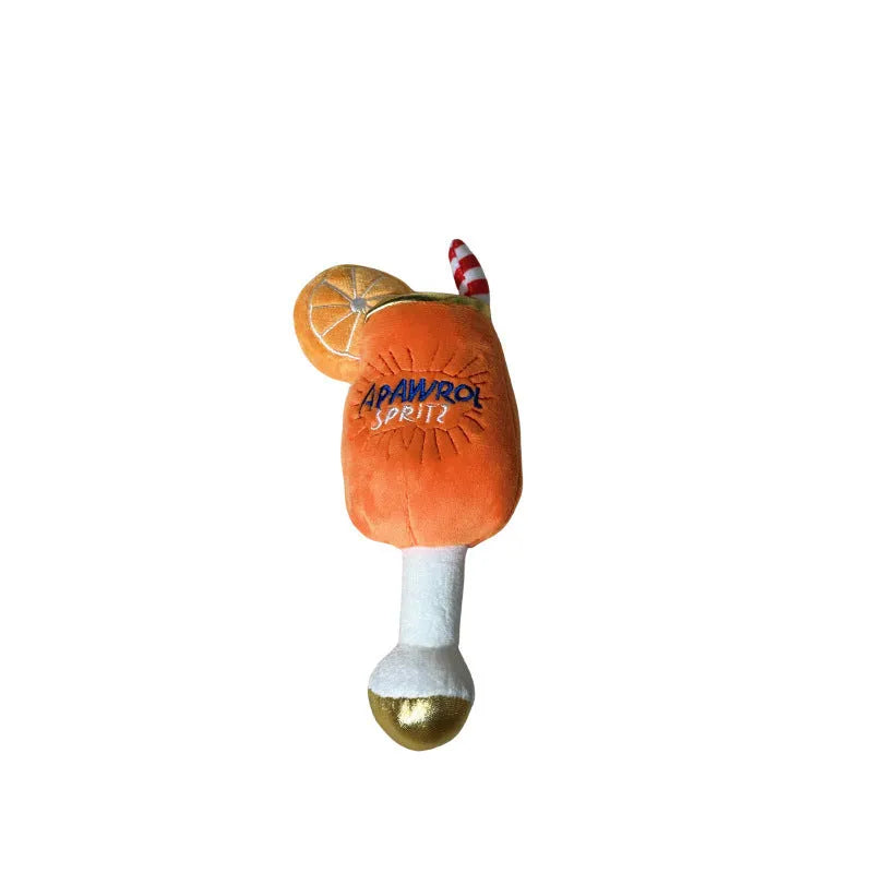 Yellow plush beer bottle squeaky dog toy with a dental cleaning feature.