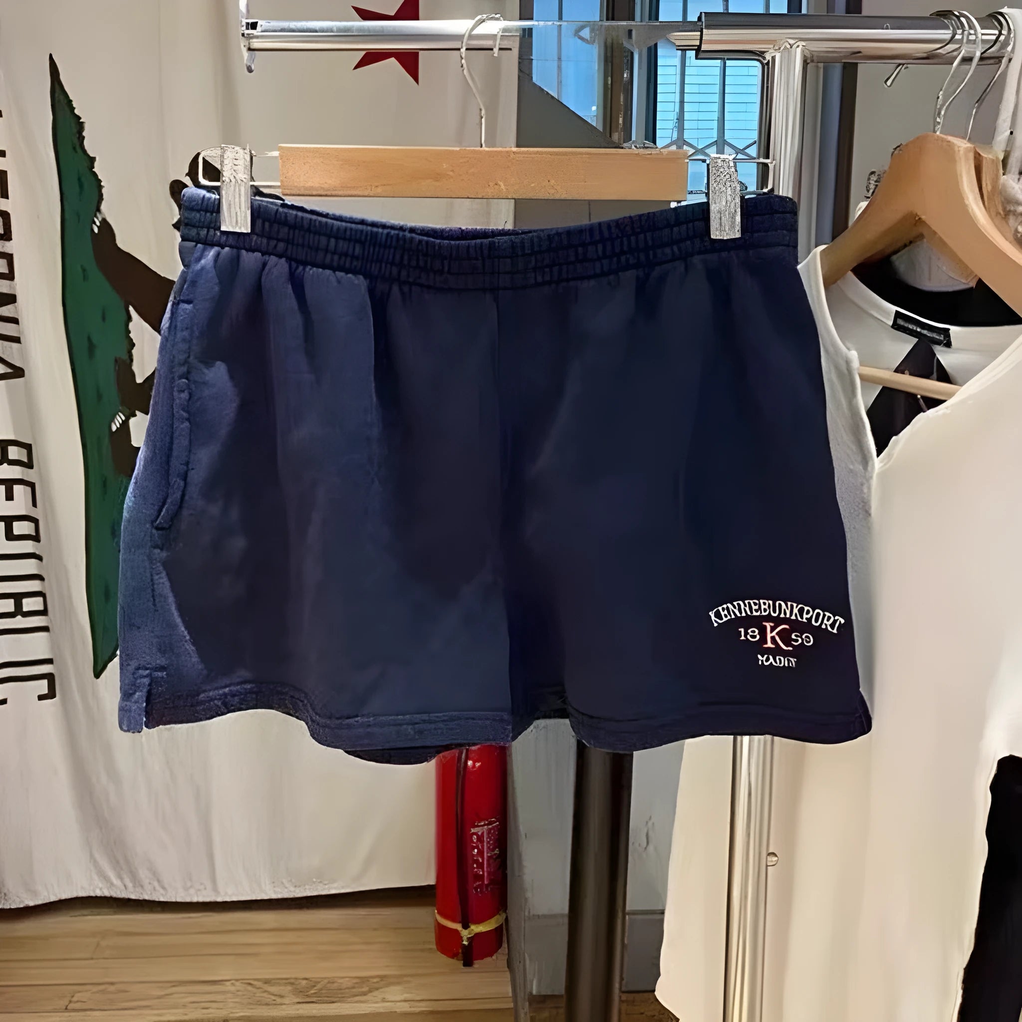 Dark blue cotton women's high-top sports shorts with white flag embroidery