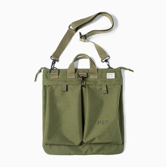 Retro canvas crossbody messenger bag in military green showing laptop compartment and phone storage