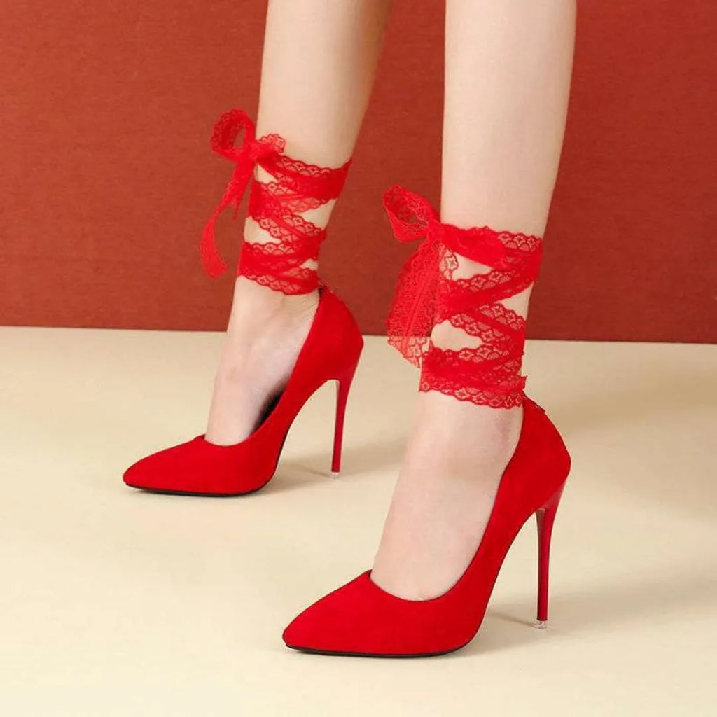 Women's black pointed toe platform heel with an ankle strap on a size 40 shoe.