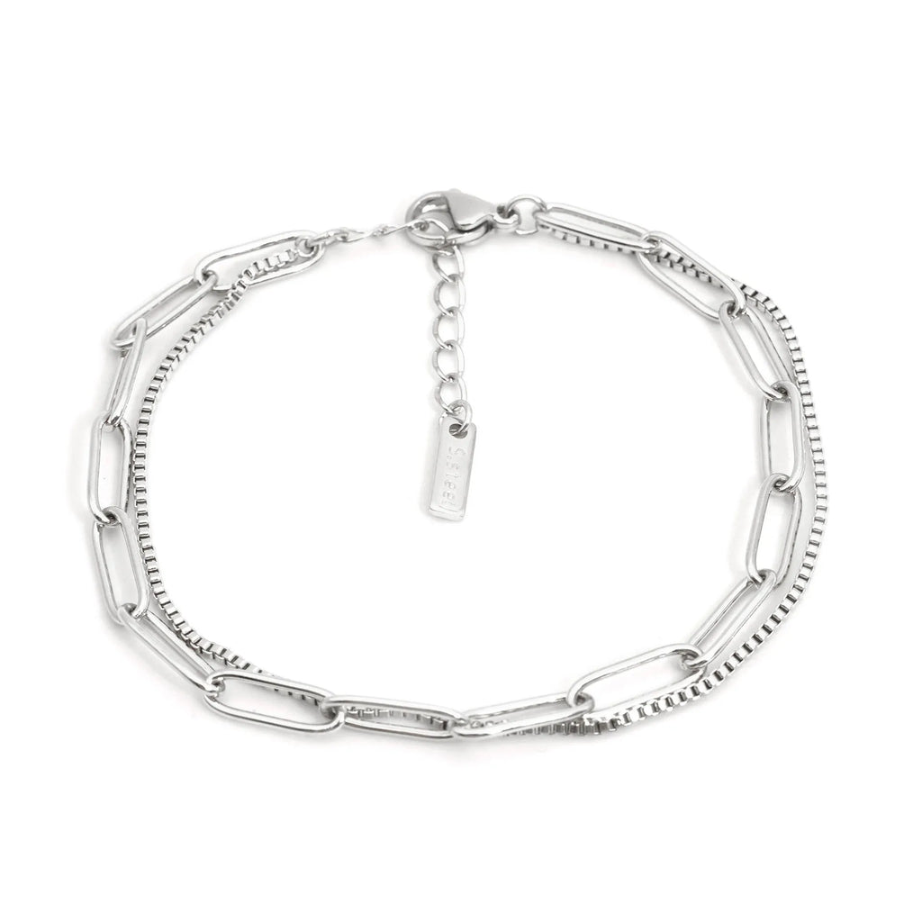 Double layer titanium steel women's bracelet with geometric design and linear patterns