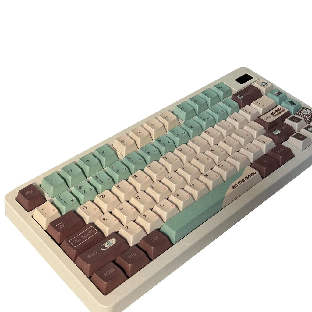 Matcha green themed ergonomic plastic wrist rest for mechanical keyboards with keycap puller.