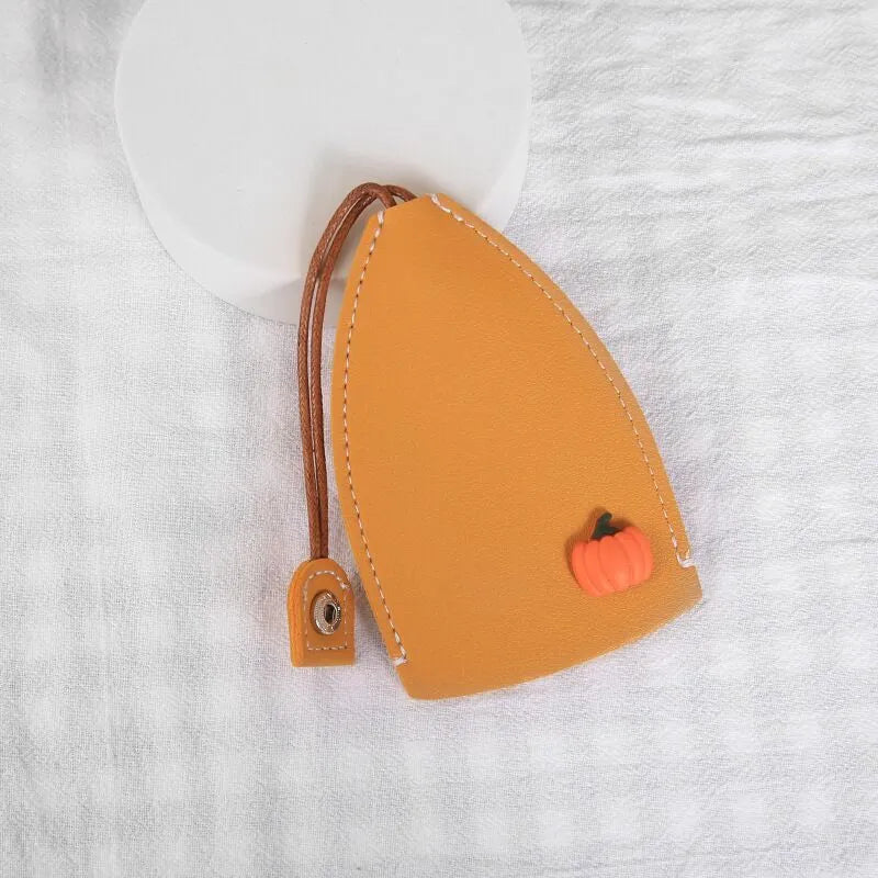 Cartoon pull-out key case in PU leather measuring 14 by 7.5 centimetres