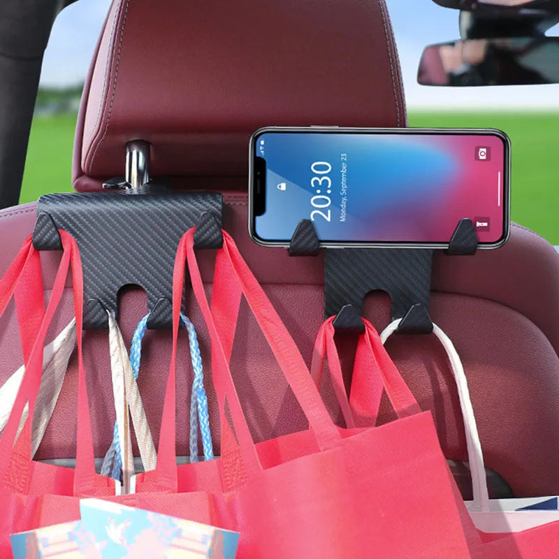 Black ABS plastic car hook with integrated phone holder bracket for rear seat organisation.