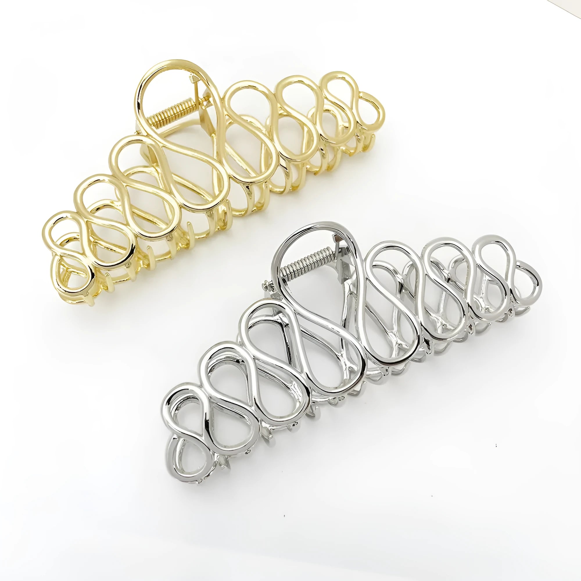Minimalist large hair clip with tassel detailing in gold or silver metallic finish for updo hairstyles