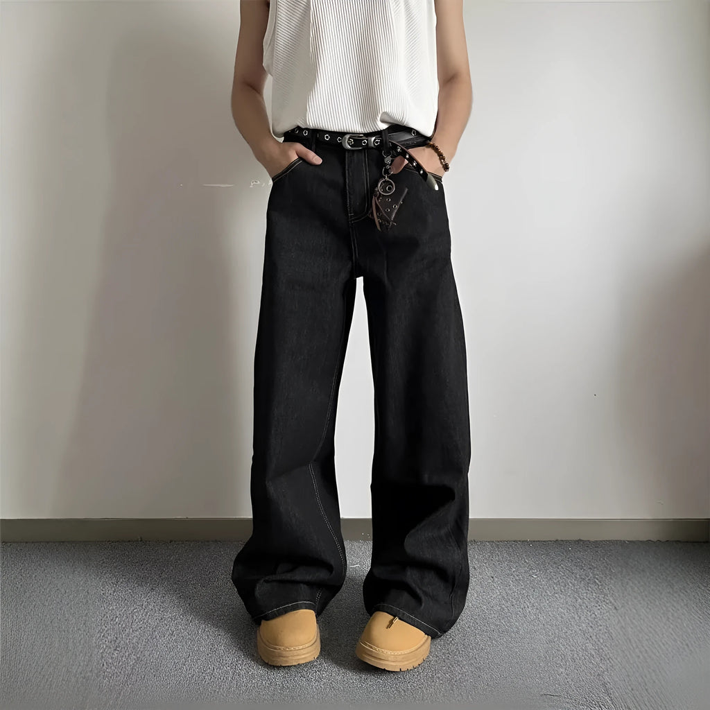 Black retro loose-fit straight-leg jeans with mid-waist and zip fly on hanger