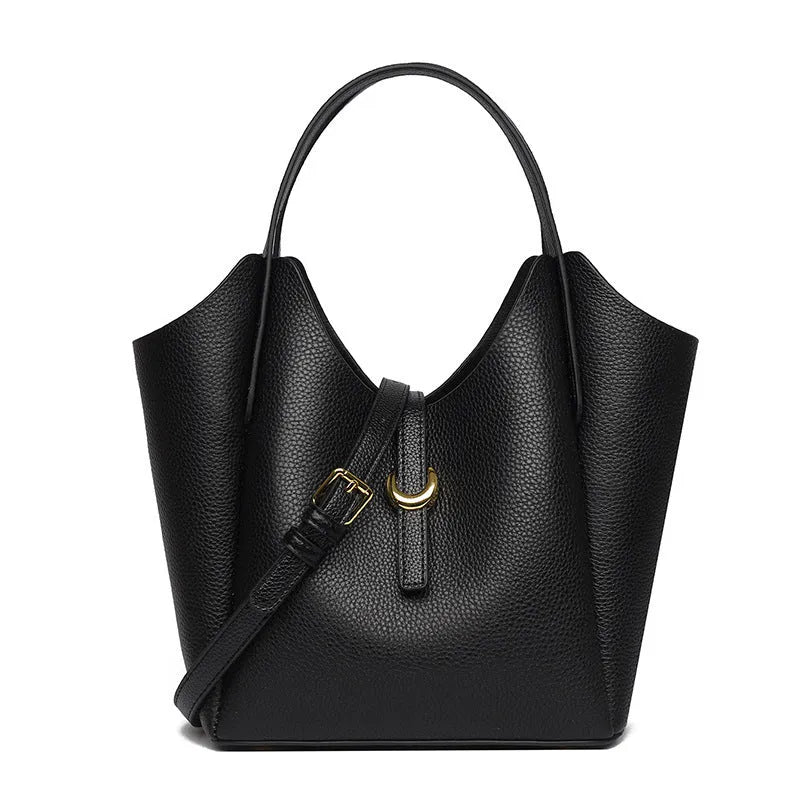 Genuine leather retro bucket handbag for women in beige, showing sewn thread detail and handheld straps.